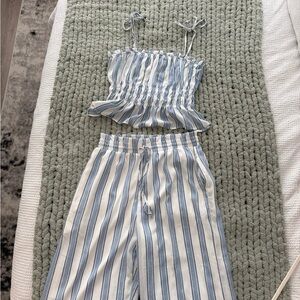 Francesca’s x Blue Rain Striped Jumpsuit in Blue and White